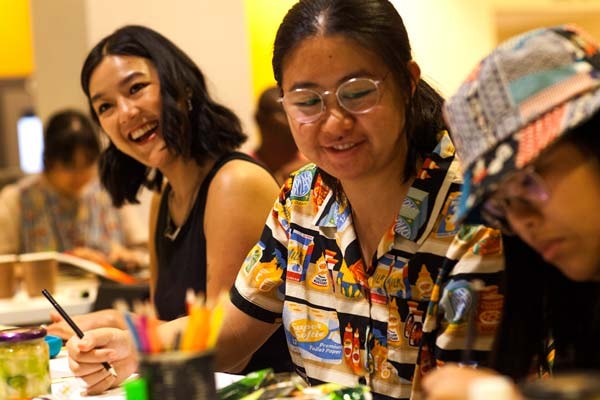 An image of participants at a Migration Museum workshop